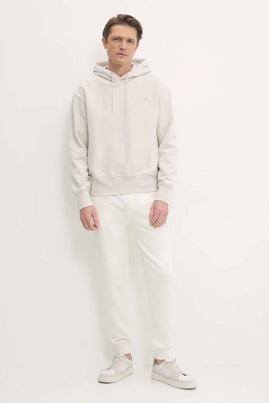 Спортивні штани Calvin Klein Jeans колір бежевий з аплікацією J30J325658