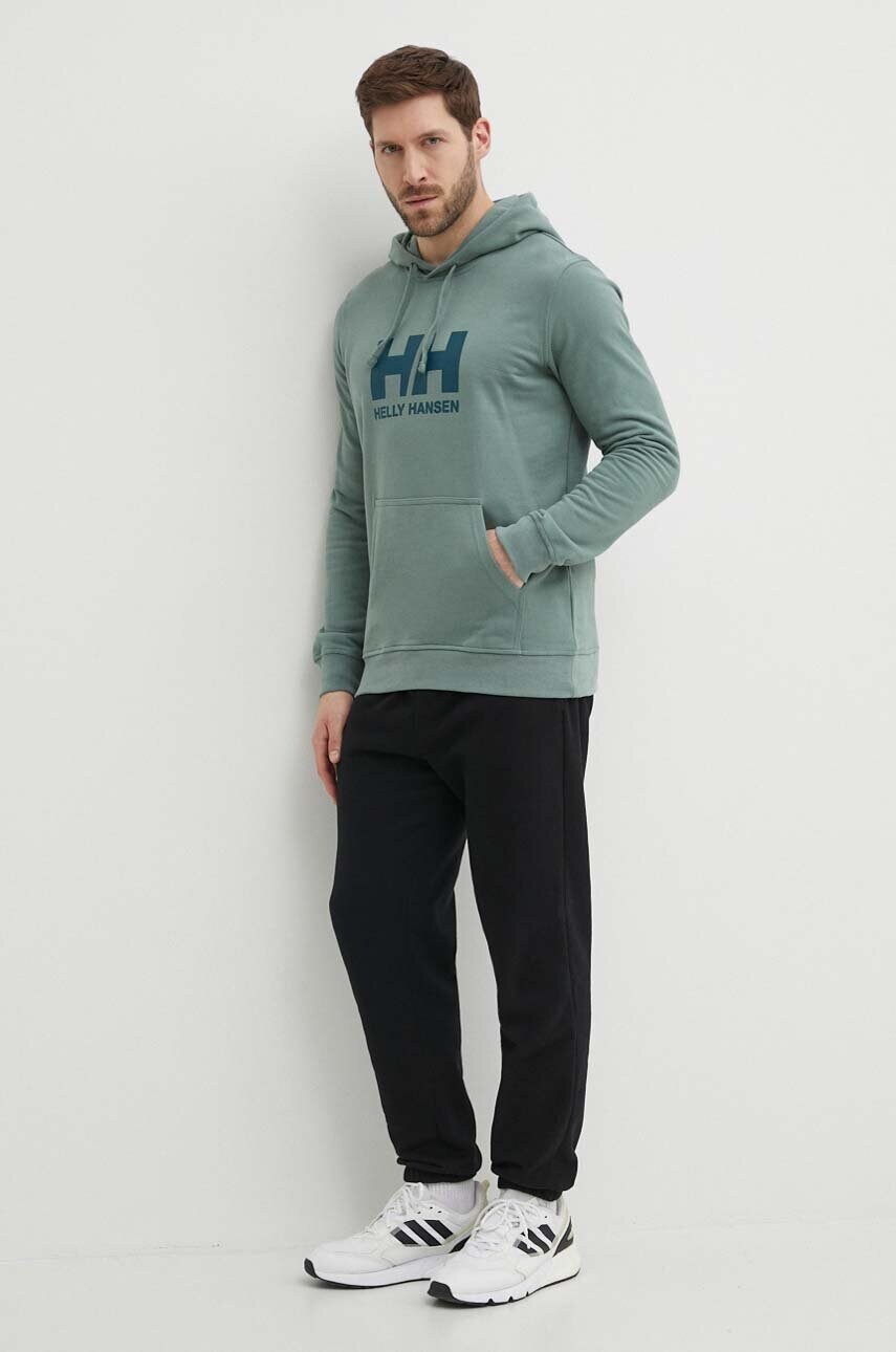 Бавовняна кофта Helly Hansen чоловіча колір зелений з капюшоном з аплікацією